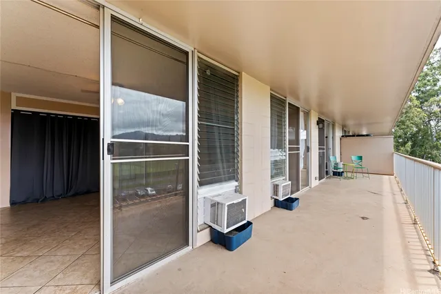 a view of livingroom with balcony