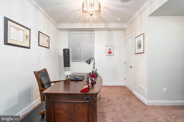 a workspace with furniture and window