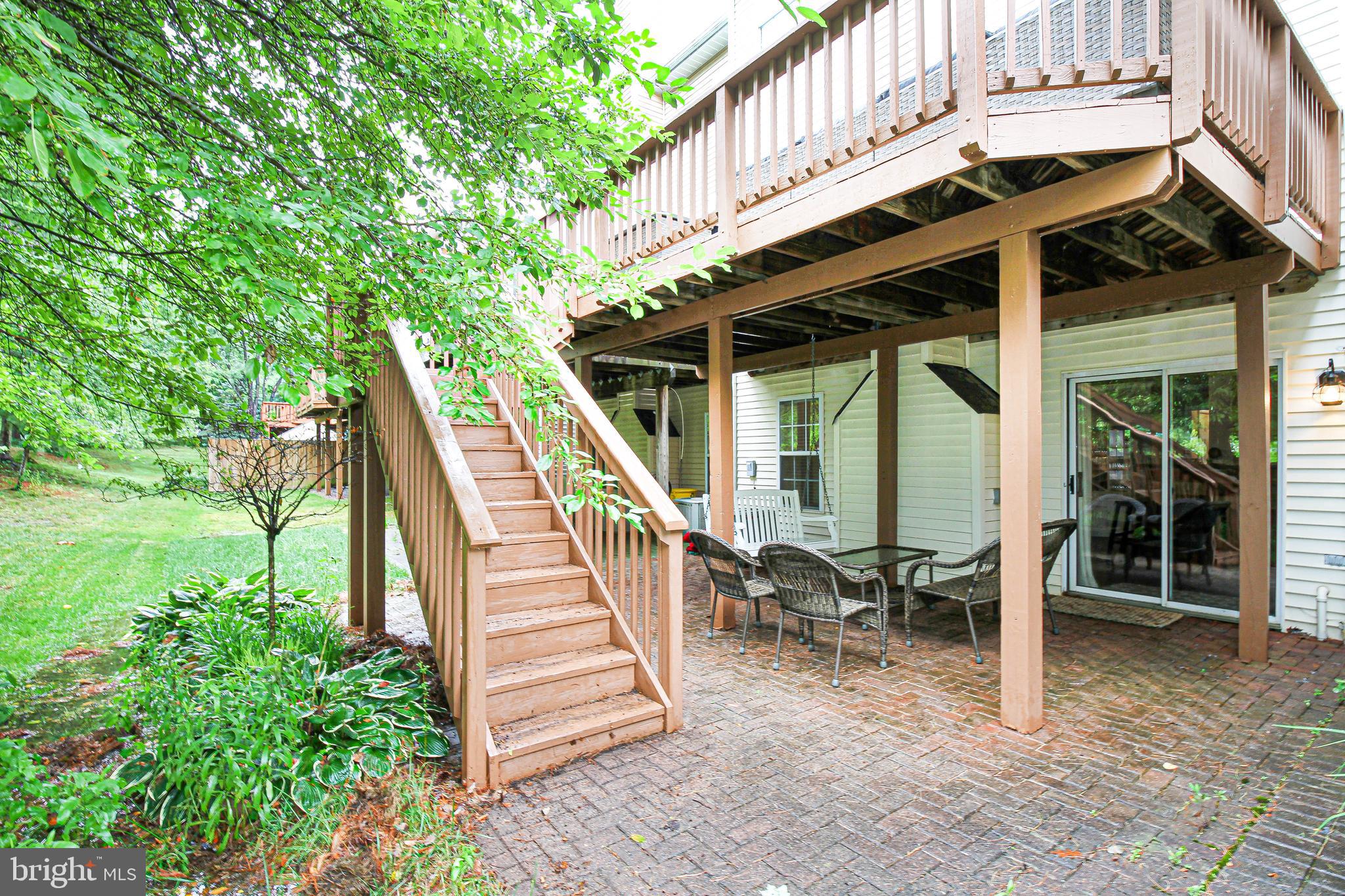 1384 Escapade Court Riva, MD 21140 - Photo 10 of 31 Patio w/stairs to deck