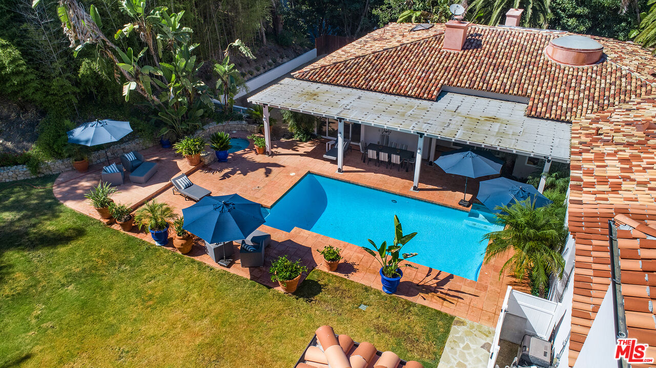 9696 Antelope Road Beverly Hills, CA 90210 - Photo 27 of 29 an aerial view of a house with swimming pool garden and patio