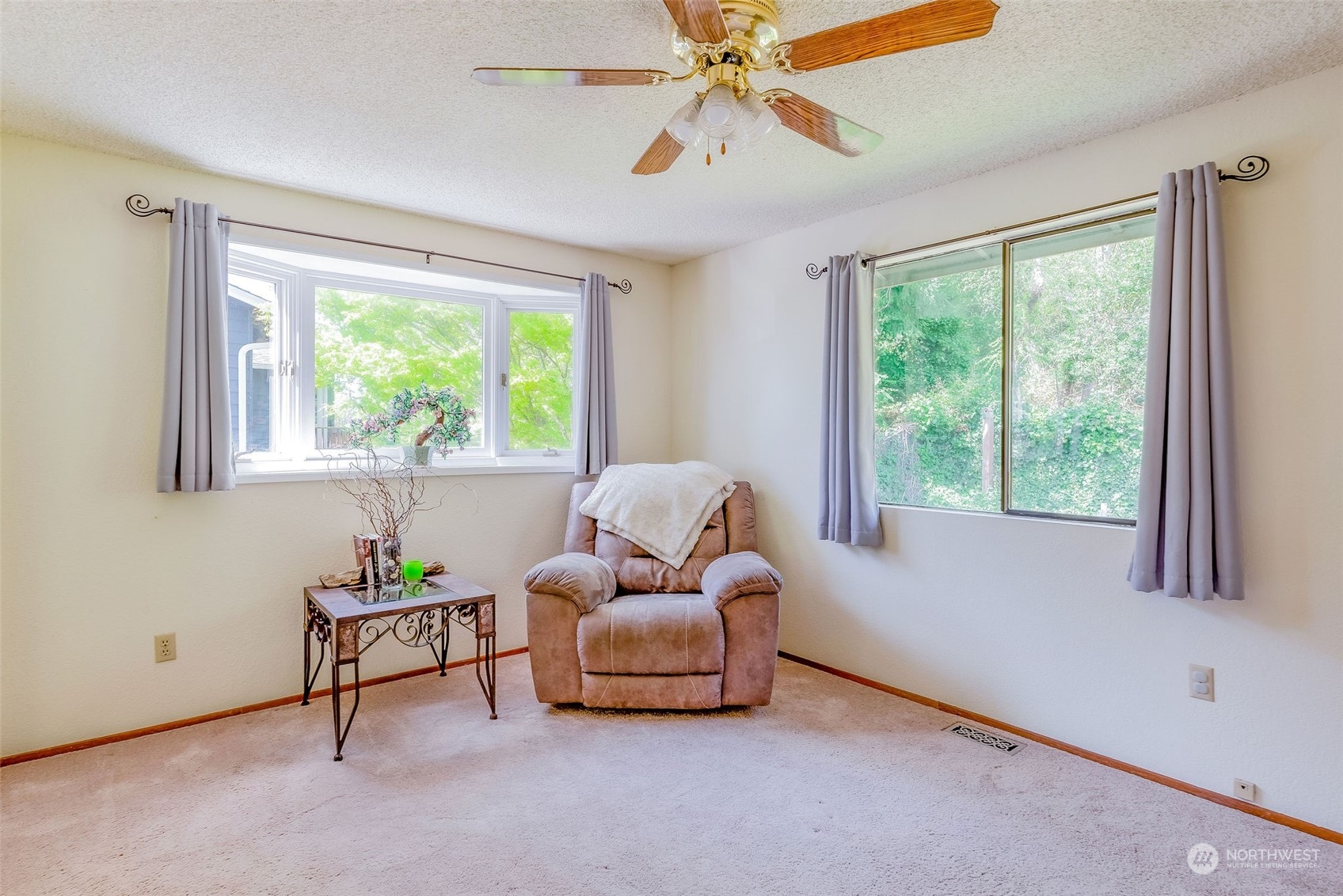 26435 Kingsview Loop Northeast Kingston, WA 98346 - Photo 13 of 25 a living room with furniture and a window
