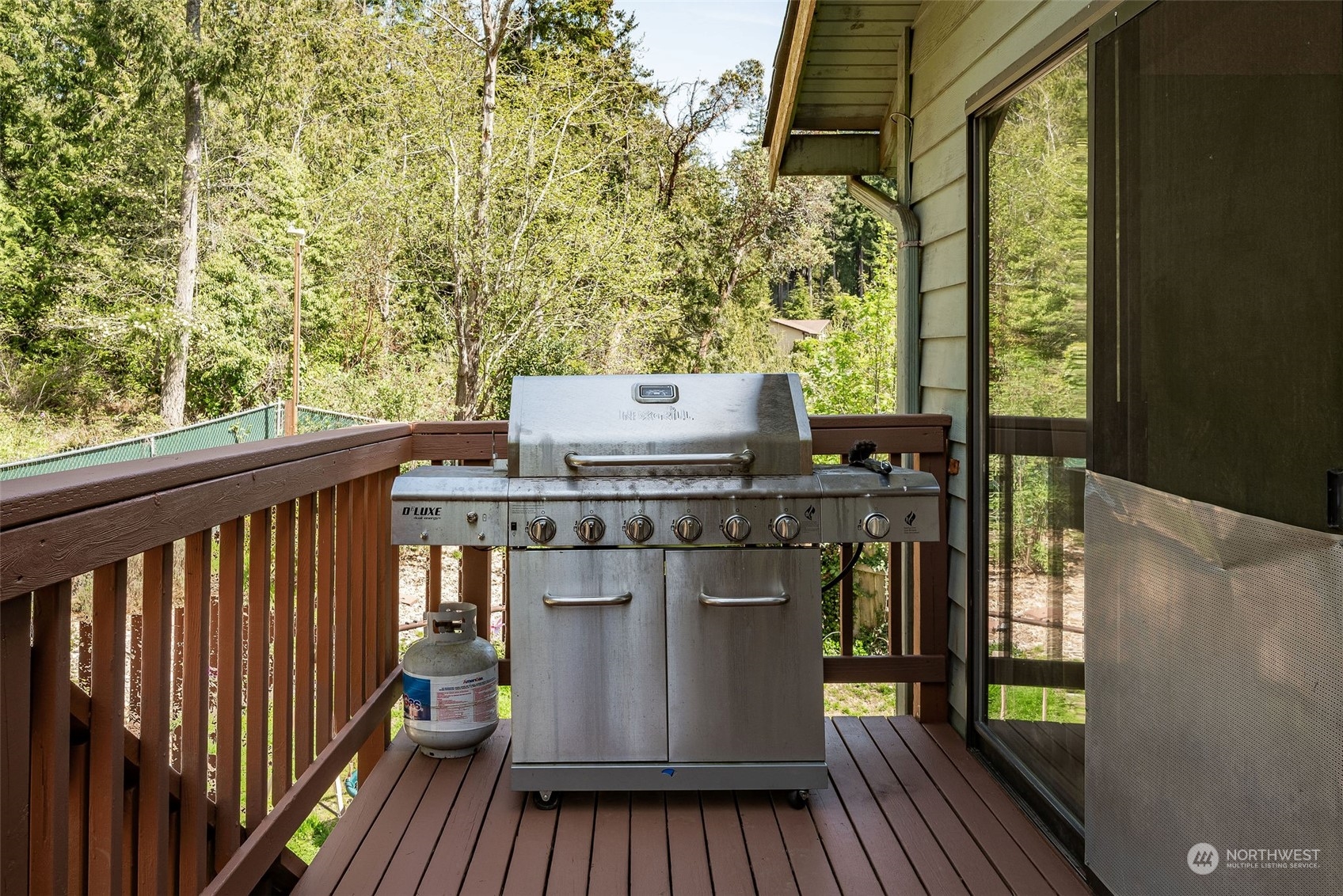26435 Kingsview Loop Northeast Kingston, WA 98346 - Photo 24 of 25 a view of a balcony with wooden floor