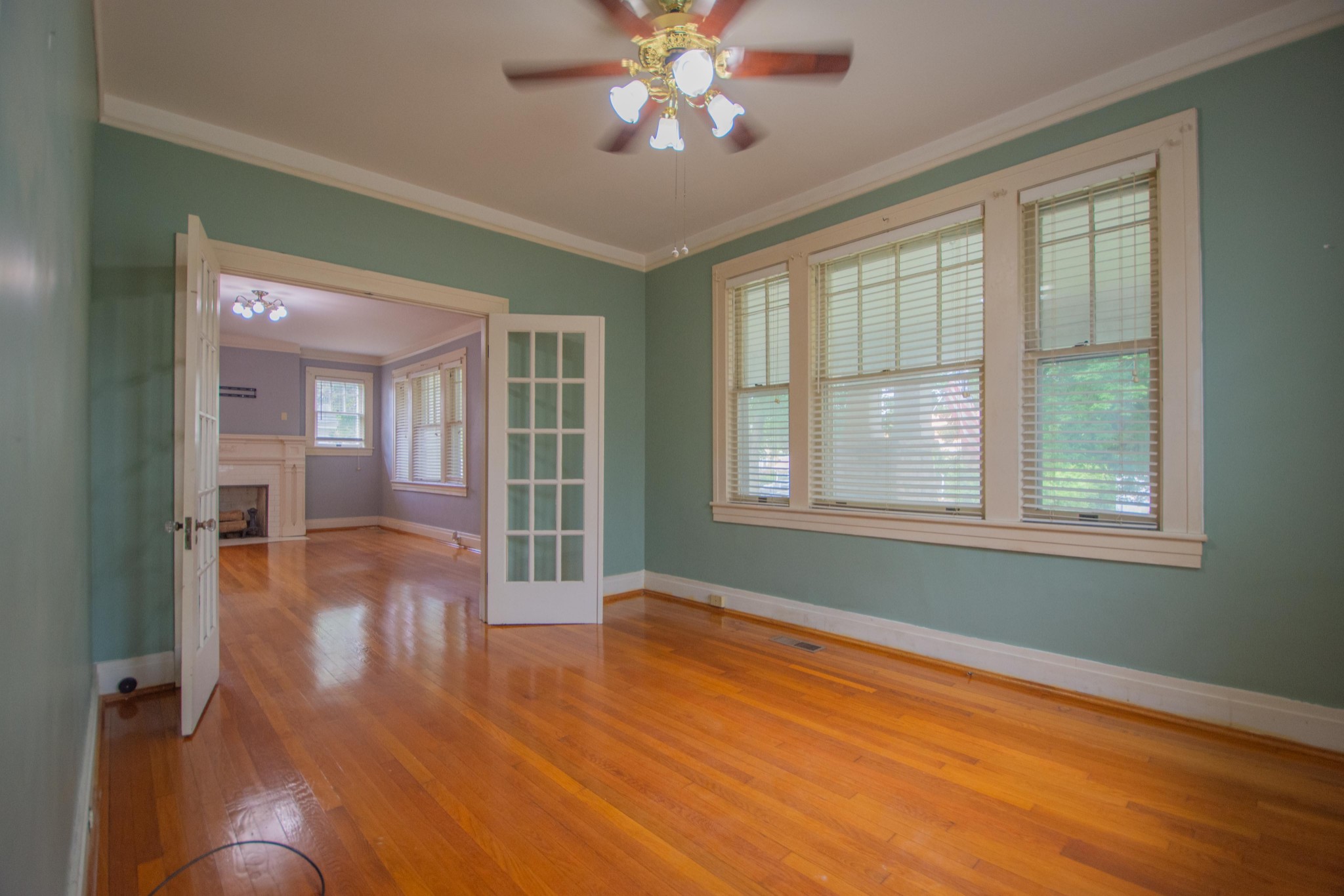 311 South 3rd Street Pulaski, TN 38478 - Photo 17 of 44 a view of livingroom with hardwood floor and ceiling fan