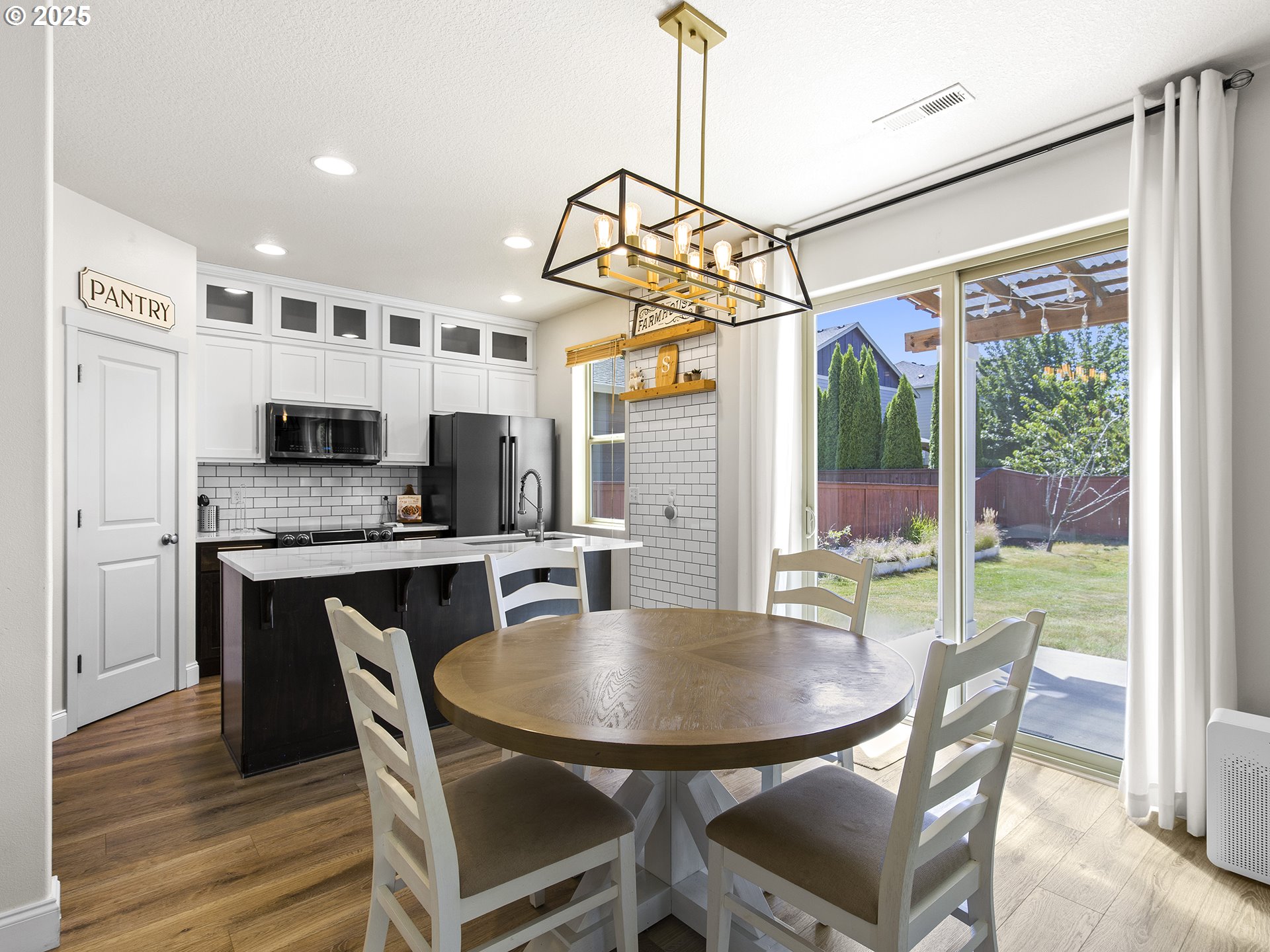 3805 North 3rd Circle Ridgefield, WA 98642 - Photo 6 of 30 a view of a dining room with furniture window and outside view