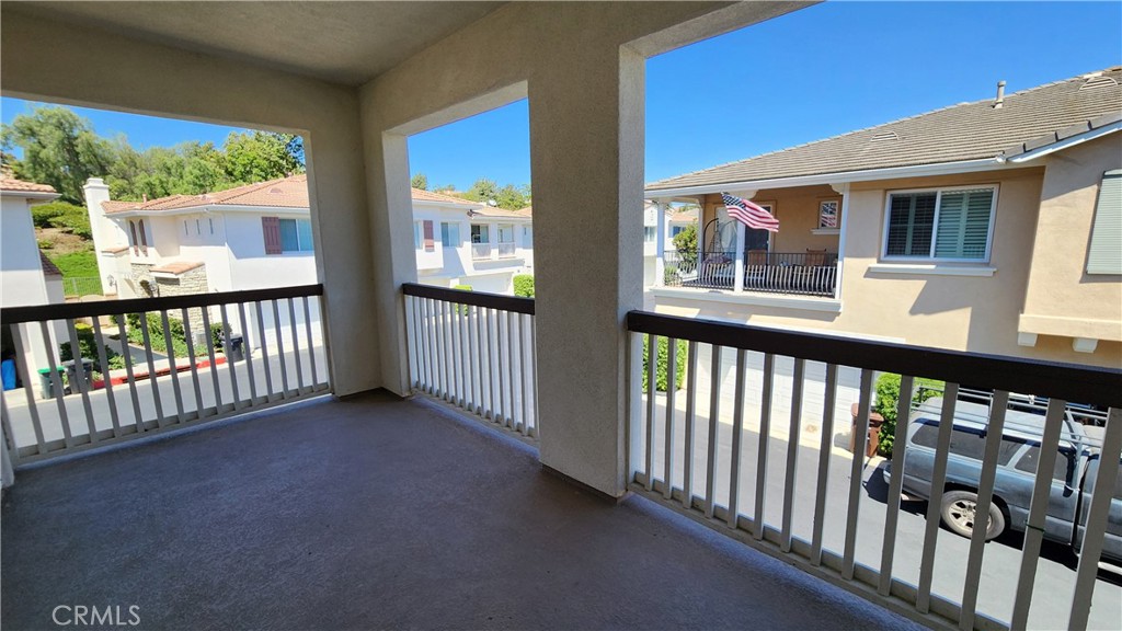 3 Camino Celeste San Clemente, CA 92673 - Photo 16 of 16 a view of a porch with wooden floor and fence