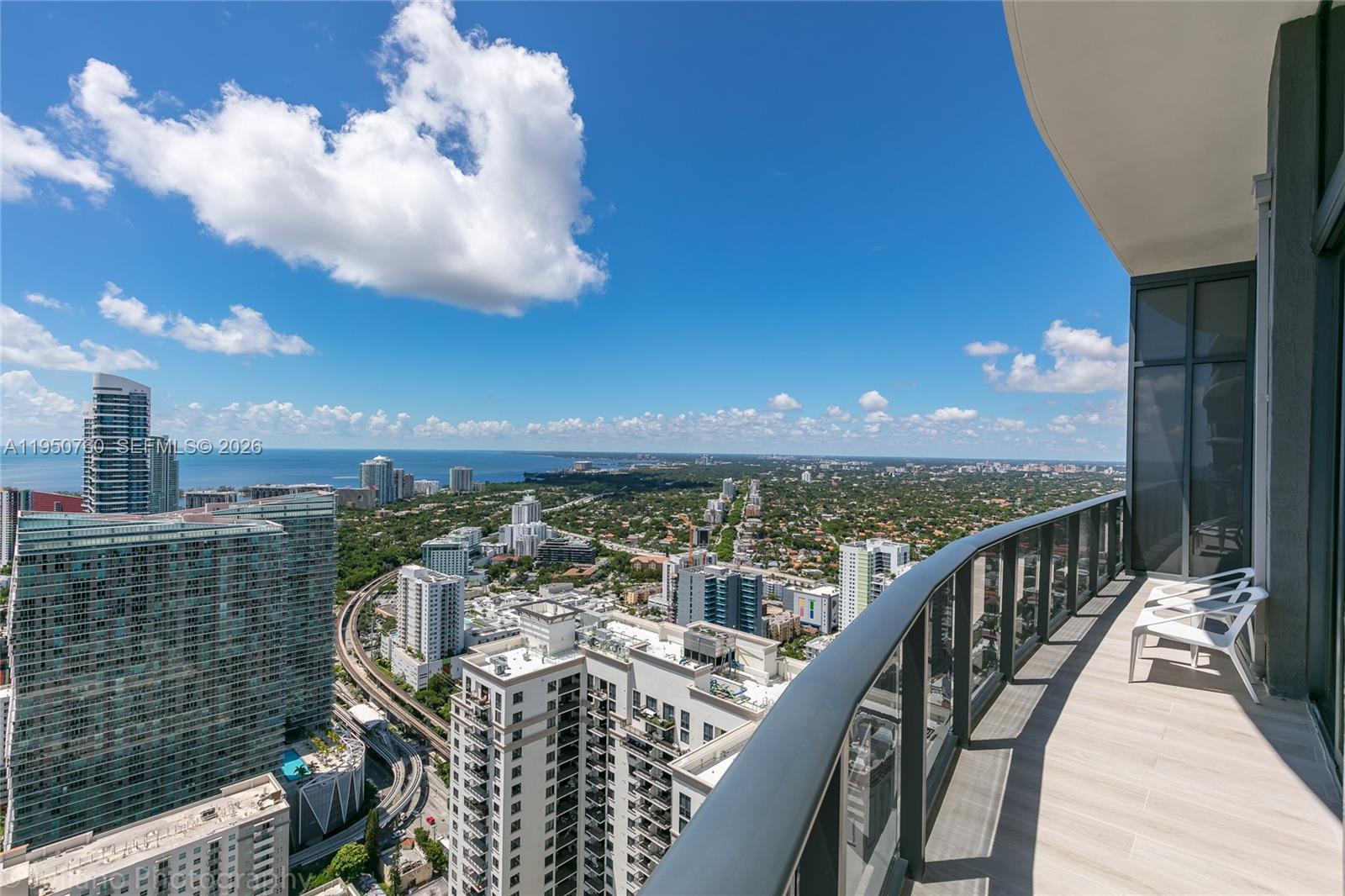 55 Southwest 9th Street, Unit PH4603 Miami, FL 33130 - Photo 14 of 48 a view of a balcony with city view