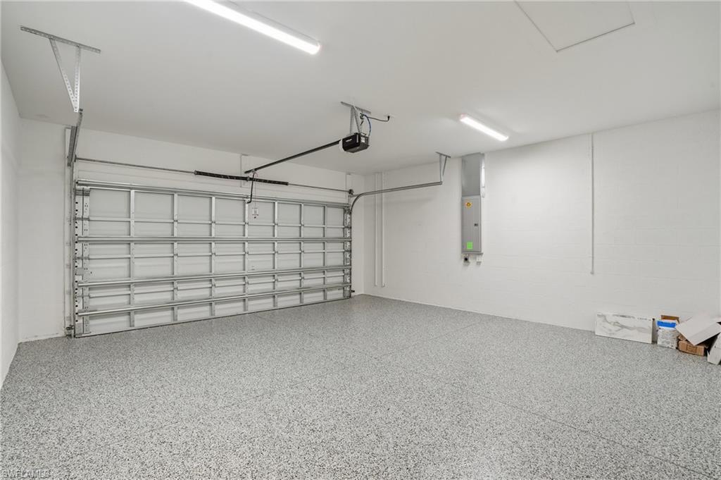 2148 Sequoia Court Naples, FL 34113 - Photo 27 of 48 a view of a garage