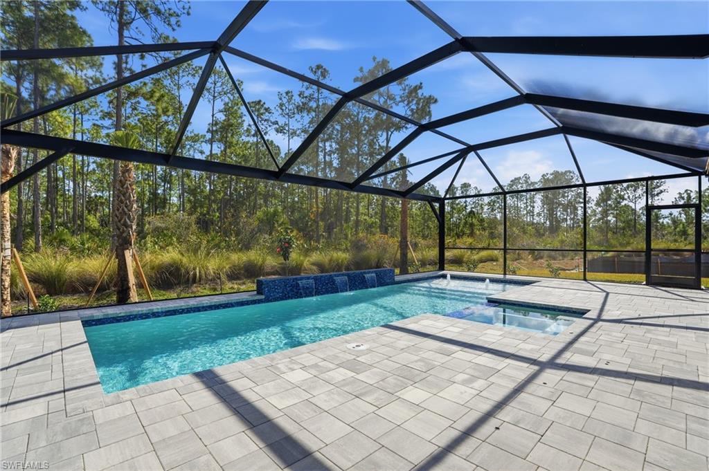 2148 Sequoia Court Naples, FL 34113 - Photo 31 of 48 a view of yard with a patio