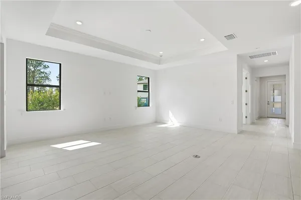 an empty room with windows