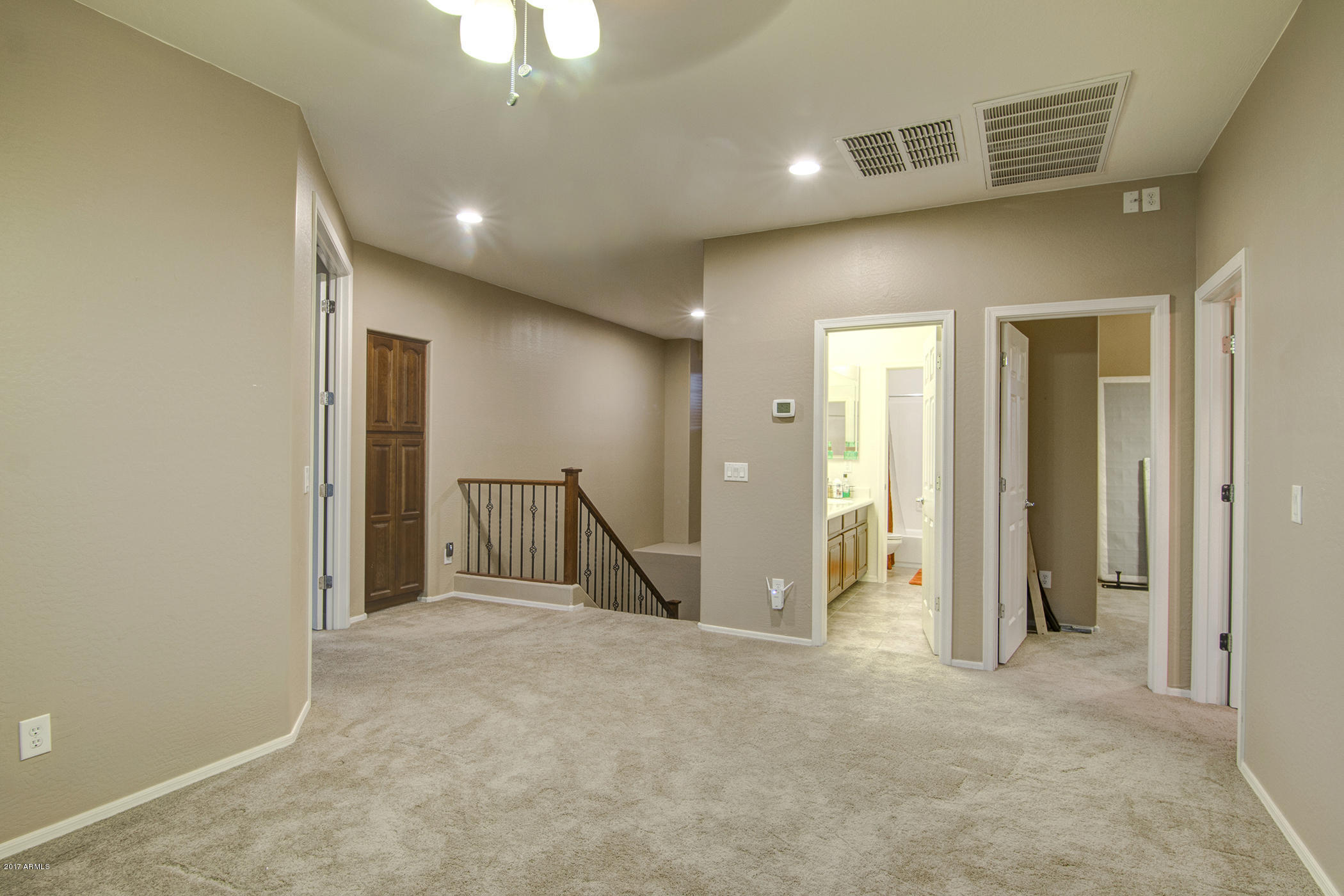 9809 South Reidar Road Laveen, AZ 85339 - Photo 19 of 30 Hallway upstairs