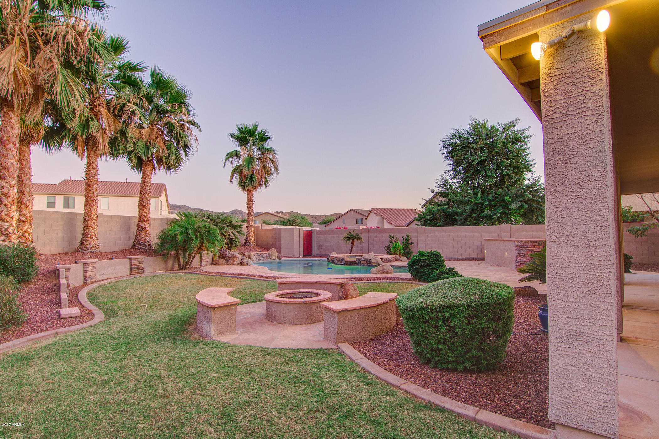 9809 South Reidar Road Laveen, AZ 85339 - Photo 27 of 30 Backyard with fire pit