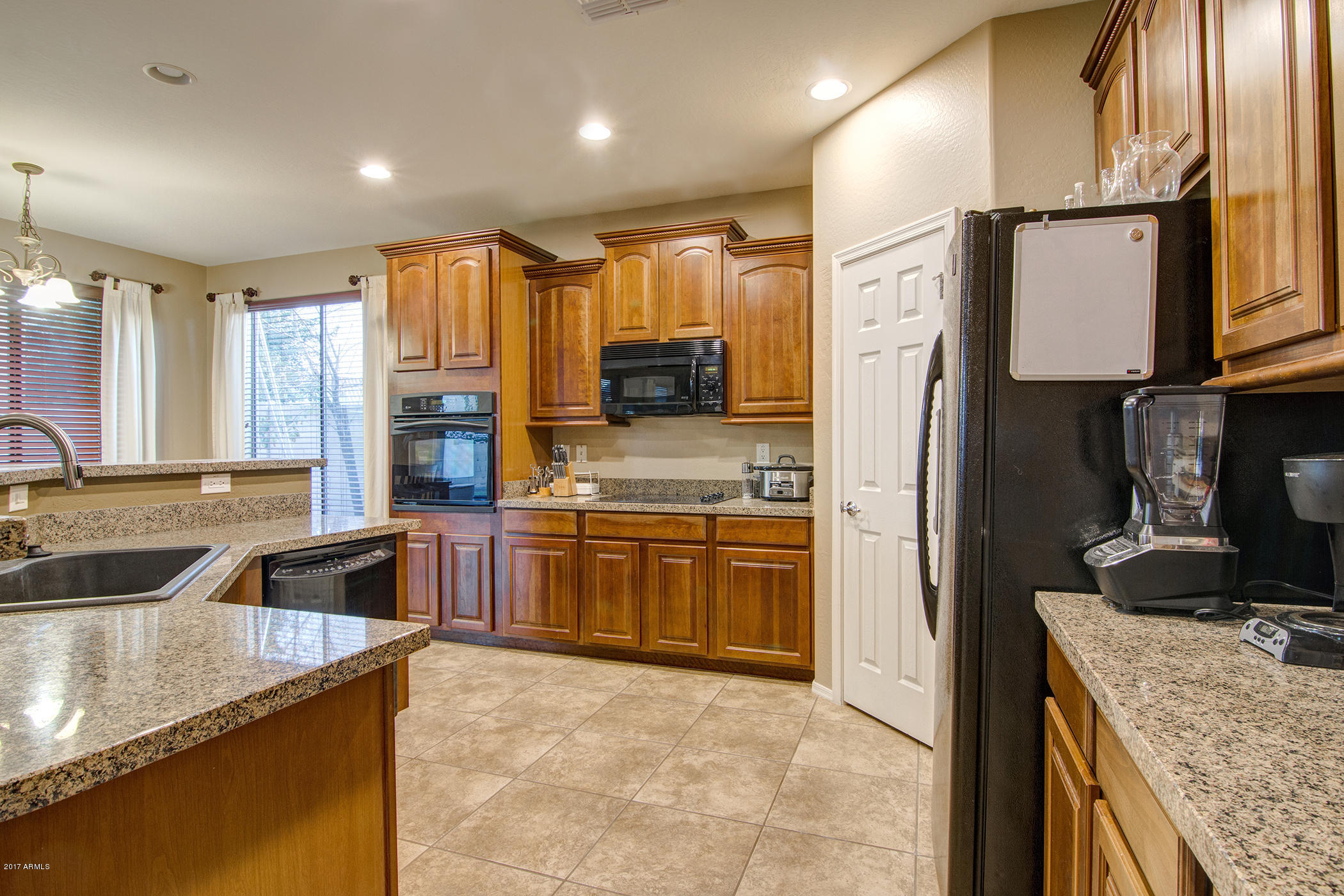9809 South Reidar Road Laveen, AZ 85339 - Photo 7 of 30 kitchen