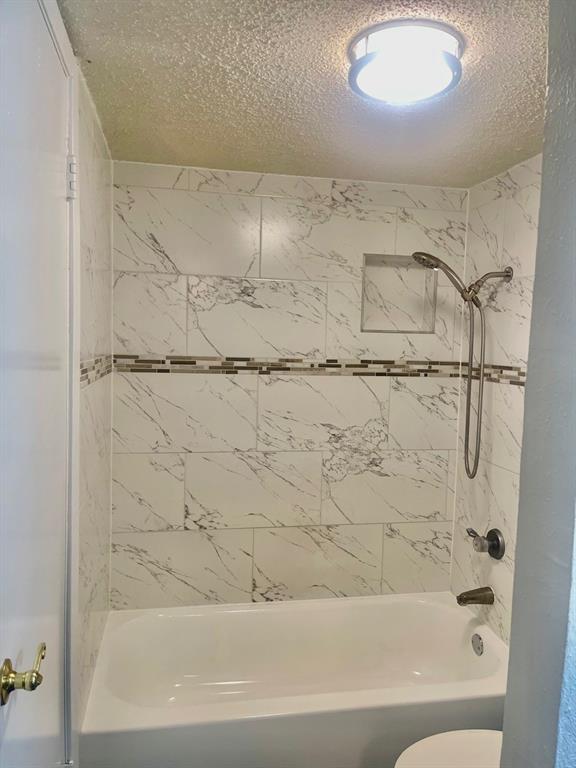 5300 Keller Springs Road, Unit 2080 Dallas, TX 75248 - Photo 22 of 28 a bathroom with a shower