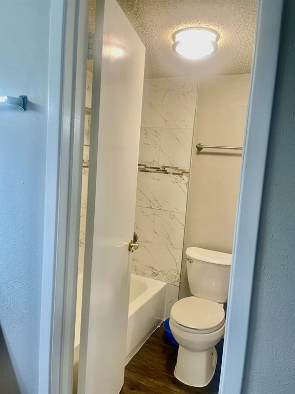 5300 Keller Springs Road, Unit 2080 Dallas, TX 75248 - Photo 23 of 28 a bathroom with a toilet and a shower