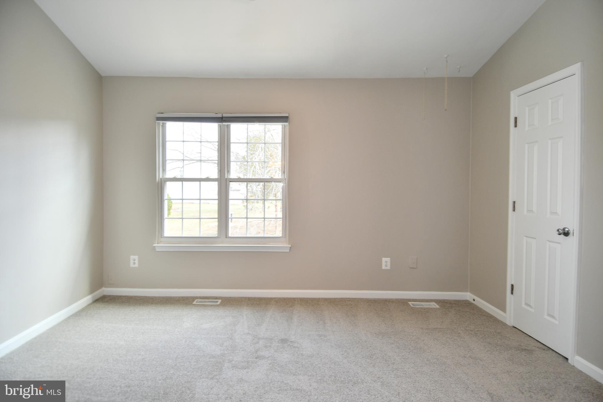 53 Essex Square Sterling, VA 20164 - Photo 14 of 25 an empty room with a window