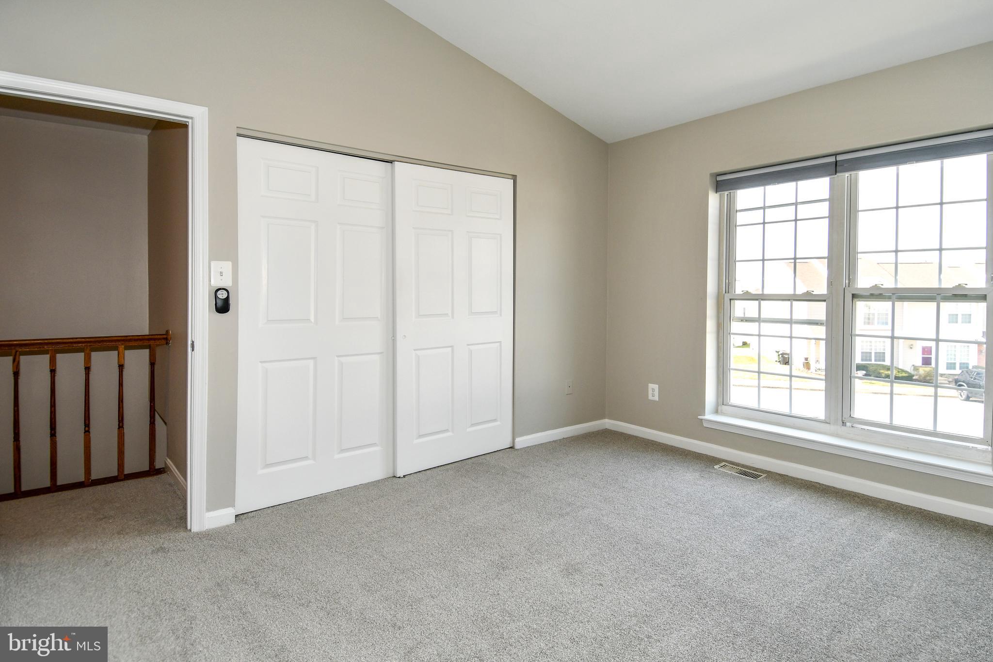 53 Essex Square Sterling, VA 20164 - Photo 16 of 25 an empty room with windows