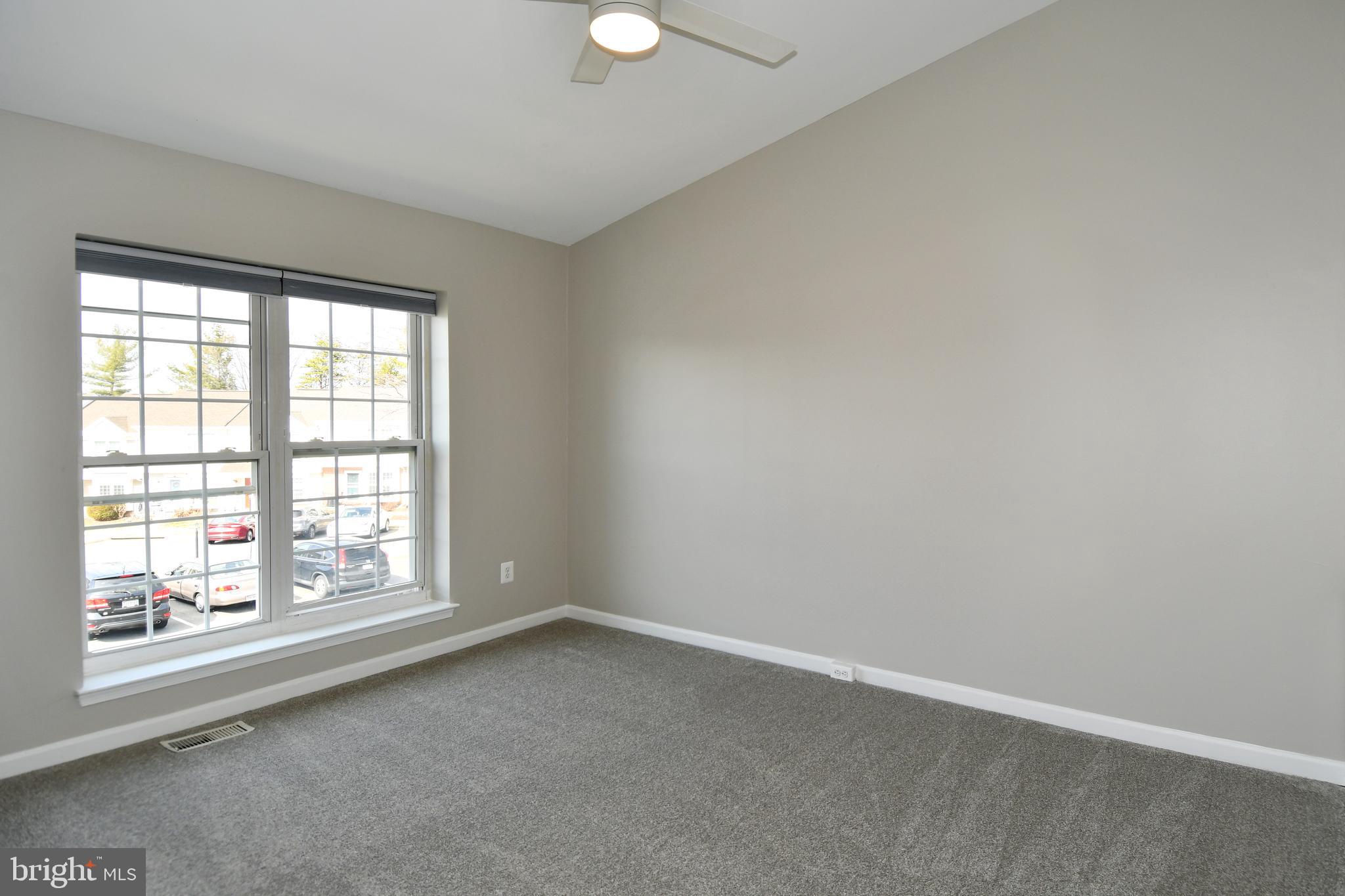 53 Essex Square Sterling, VA 20164 - Photo 17 of 25 an empty room with a window