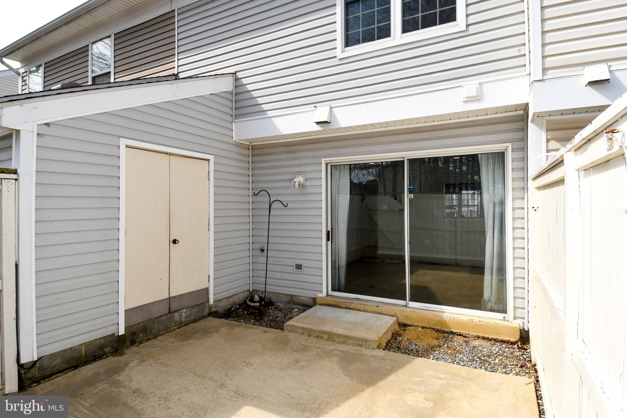 53 Essex Square Sterling, VA 20164 - Photo 22 of 25 a view of a entrance door of the house