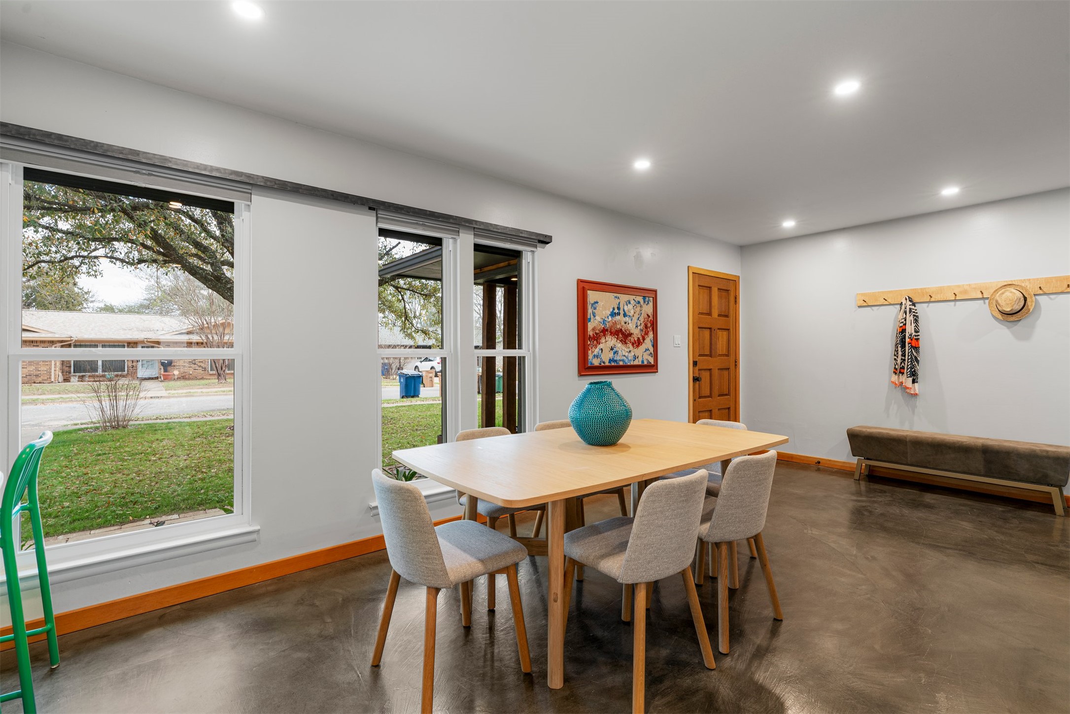 1111 Radam Circle Austin, TX 78745 - Photo 14 of 40 The dining room’s location near the entry gives it flexibility beyond traditional meals, easily serving as a game room, gathering space, or creative area depending on how the home is used