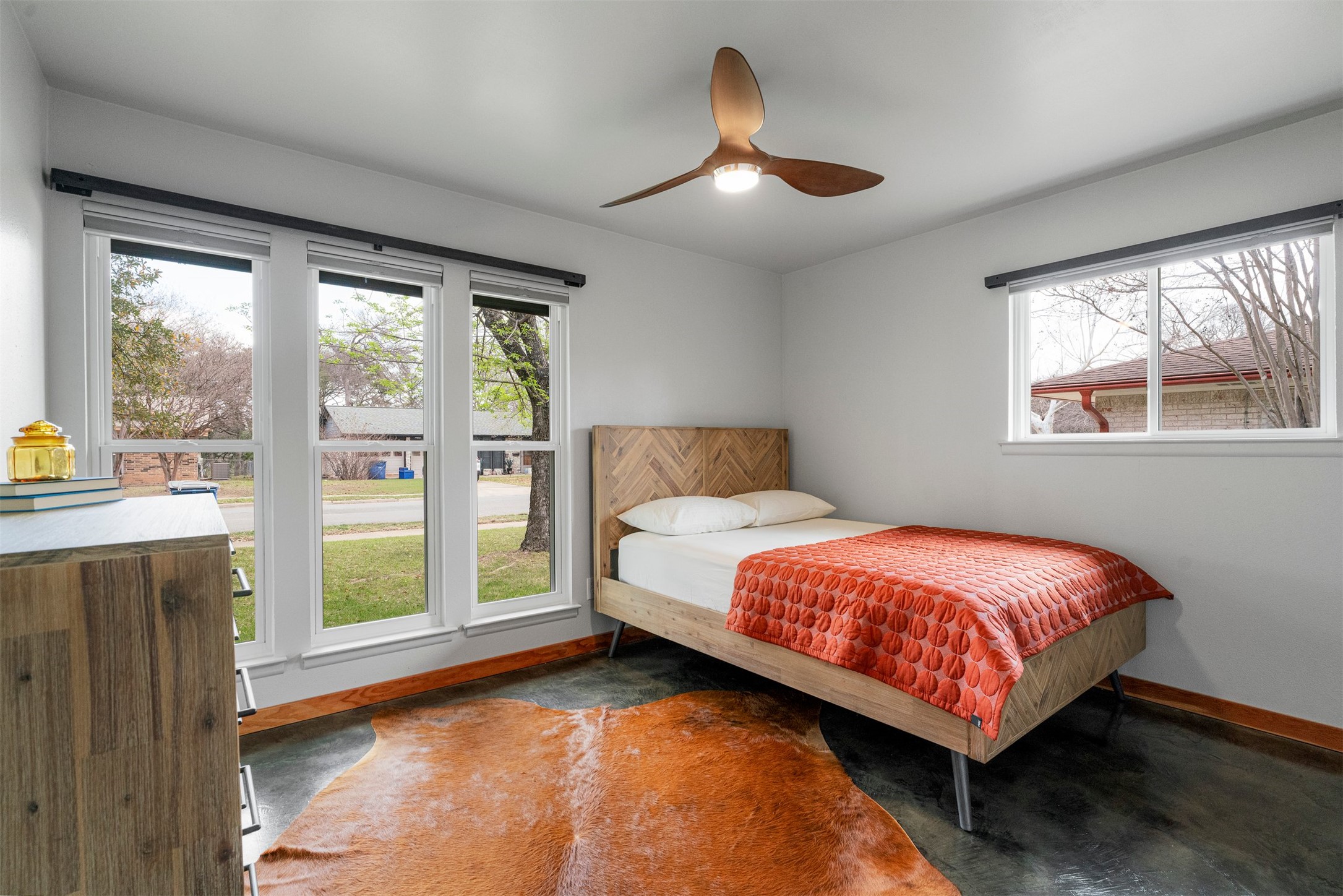 1111 Radam Circle Austin, TX 78745 - Photo 29 of 40 The guest bedrooms each offer comfortable layouts with large windows that bring in natural light, making them well suited for family, visiting guests, or everyday use