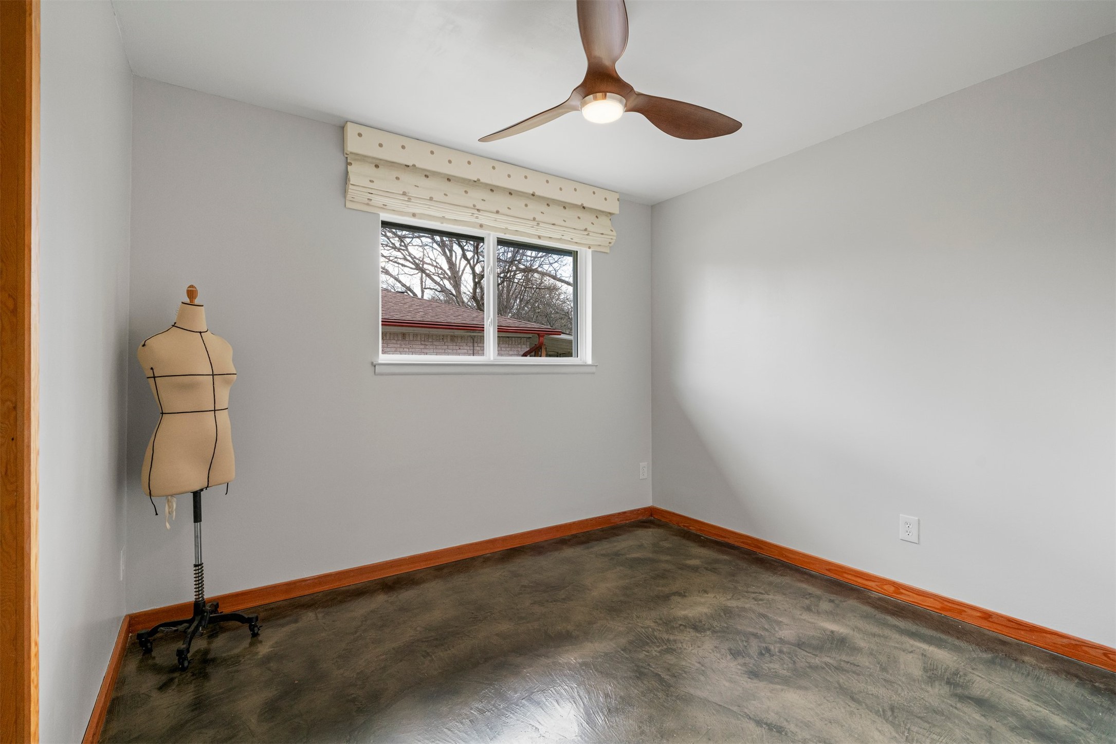 1111 Radam Circle Austin, TX 78745 - Photo 31 of 40 Both guest bedrooms provide flexible space for a variety of setups, from traditional bedrooms to workspaces, hobby rooms, or study areas depending on how the home is used