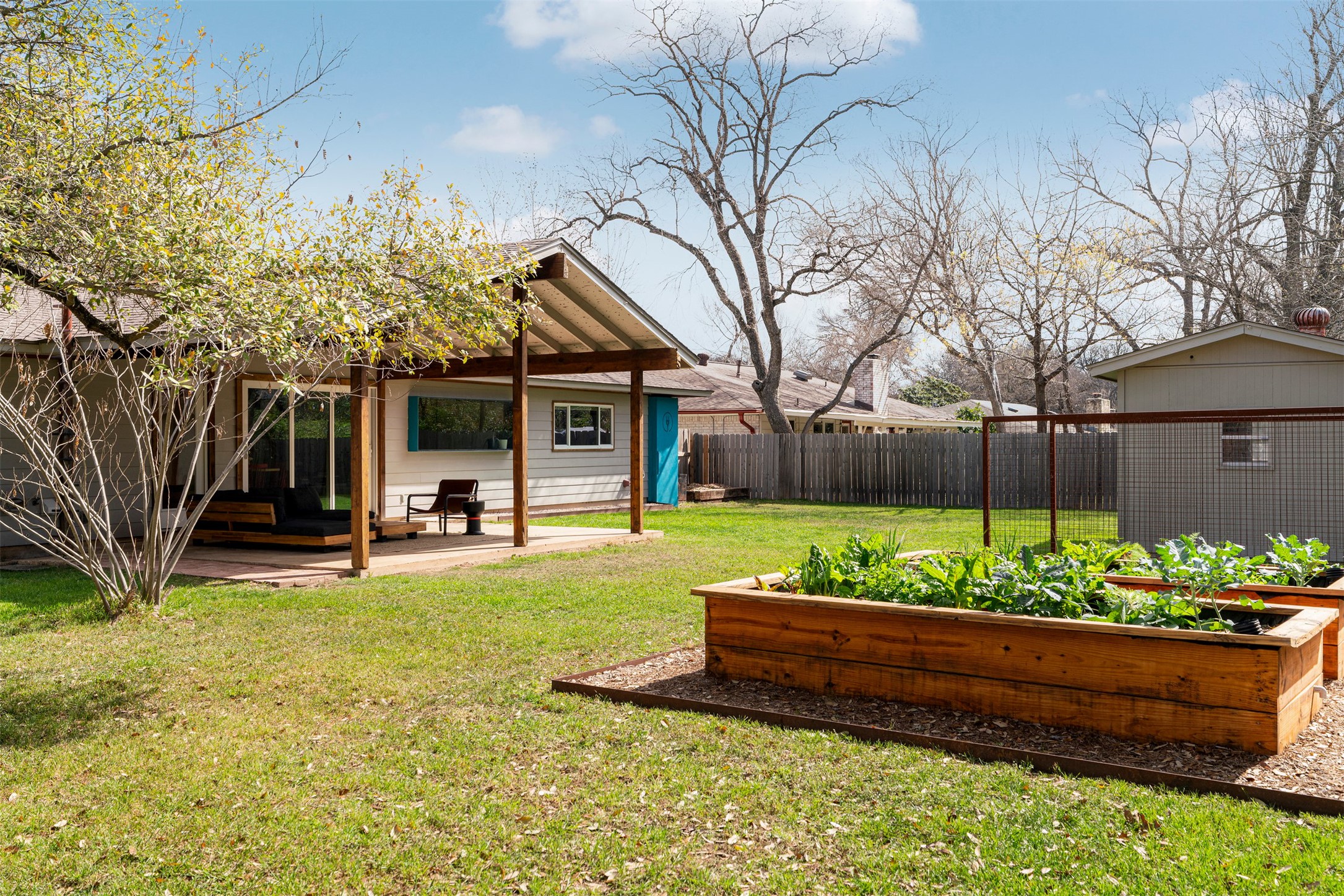 1111 Radam Circle Austin, TX 78745 - Photo 36 of 40 Mature greenery and established garden areas add character to the yard, creating a setting that feels both welcoming and full of possibility