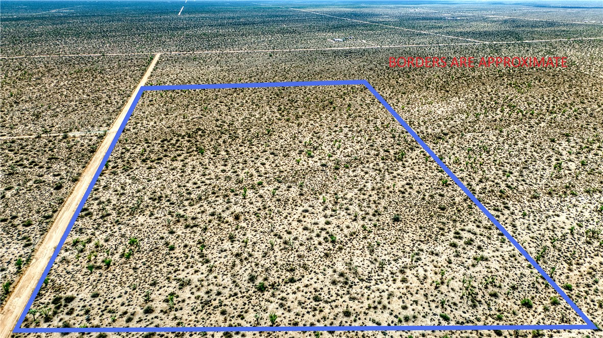 19595 South Kit Carson Road Yucca, AZ 86438 - Photo 13 of 18 Aerial view of sparsely populated area with a desert landscape