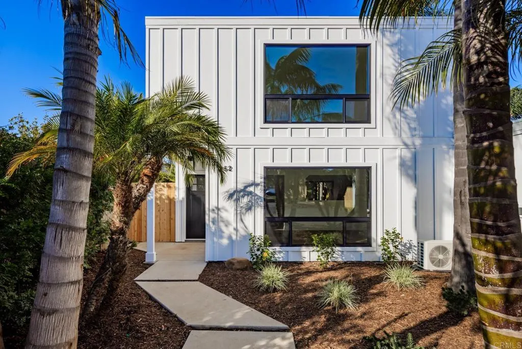250 Hillcrest Drive Encinitas, CA 92024 - Photo 9 of 54 a front view of a house with a yard
