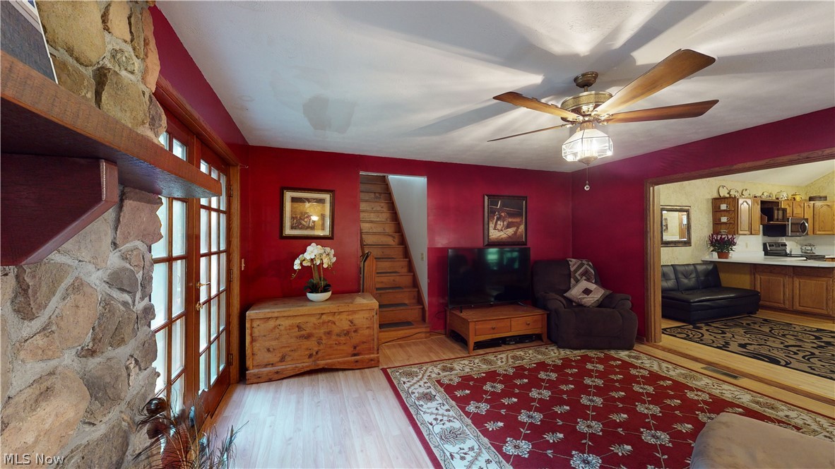 685 Horseneck Road Waverly, WV 26184 - Photo 9 of 32 LIVING ROOM W VIEW OF STAIRWELL UPSTAIRS