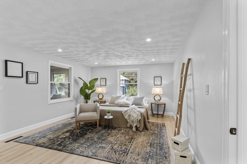 181 Green Street Stoneham, MA 02180 - Photo 13 of 42 a living room with furniture and a rug