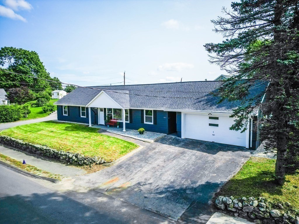 181 Green Street Stoneham, MA 02180 - Photo 37 of 42 a front view of a house with a garden