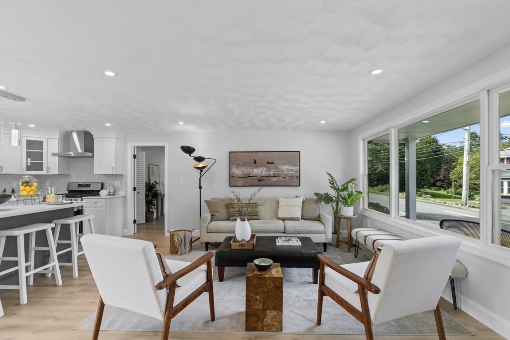 181 Green Street Stoneham, MA 02180 - Photo 4 of 42 a living room with furniture and a large window