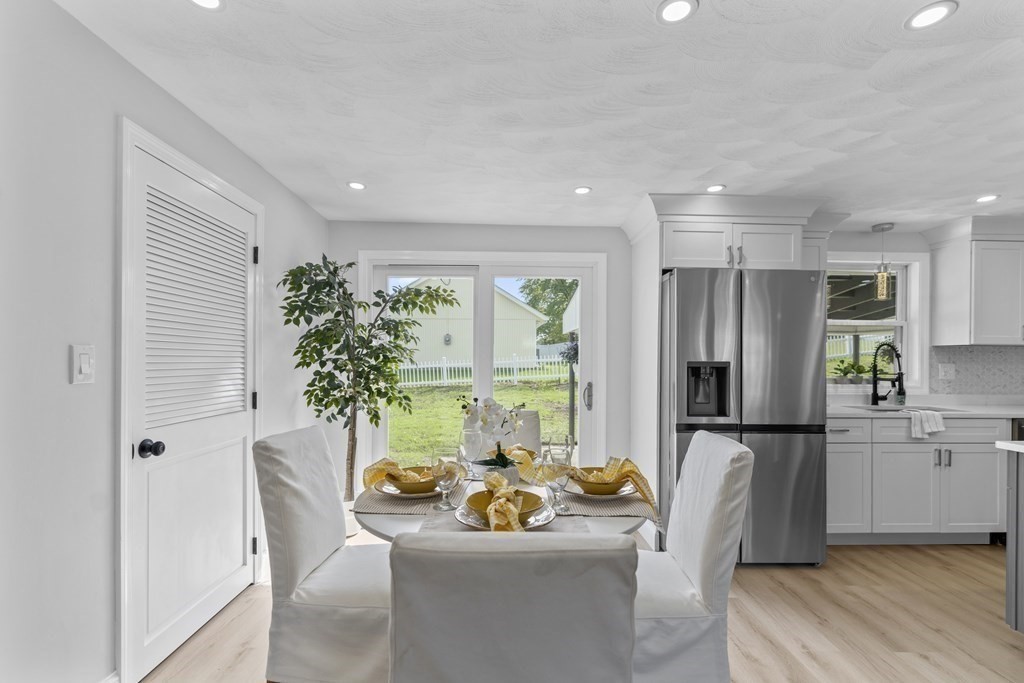 181 Green Street Stoneham, MA 02180 - Photo 10 of 42 a living room with furniture and a large window
