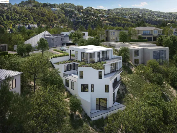 a aerial view of a house with a yard