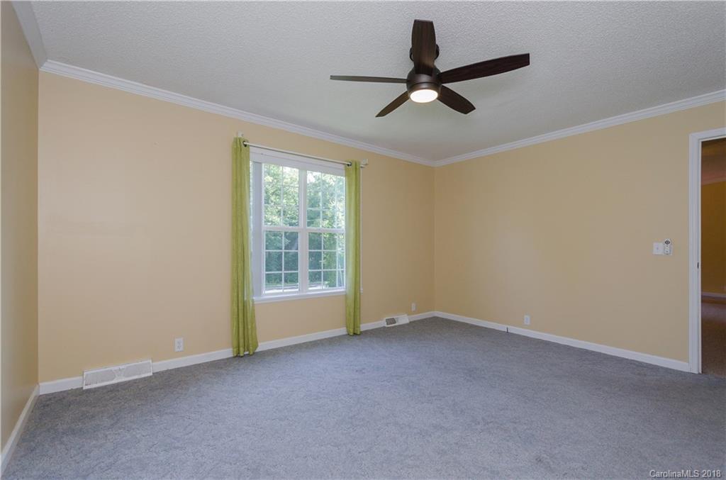 452 Souther Road Fletcher, NC 28732 - Photo 14 of 24 a view of a livingroom with a ceiling fan and window