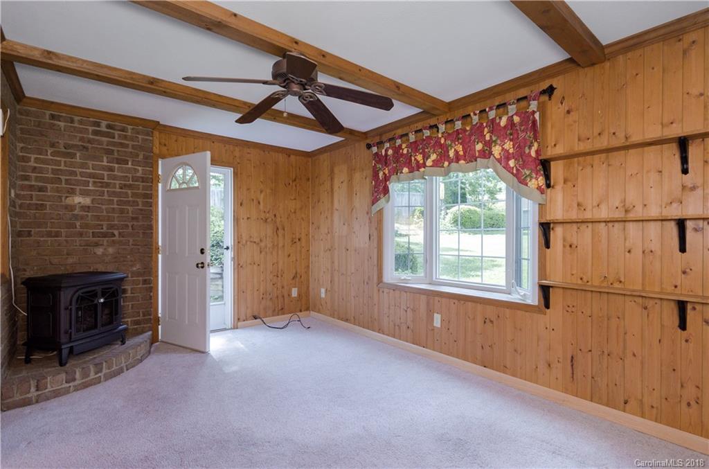 452 Souther Road Fletcher, NC 28732 - Photo 9 of 24 a view of empty room with a fireplace