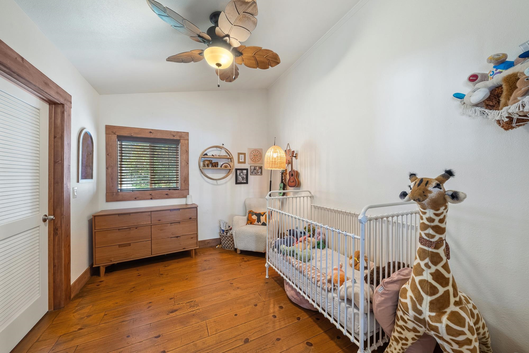 323 West Kuiaha Road Haiku, HI 96708 - Photo 22 of 30 a bedroom with furniture and a window