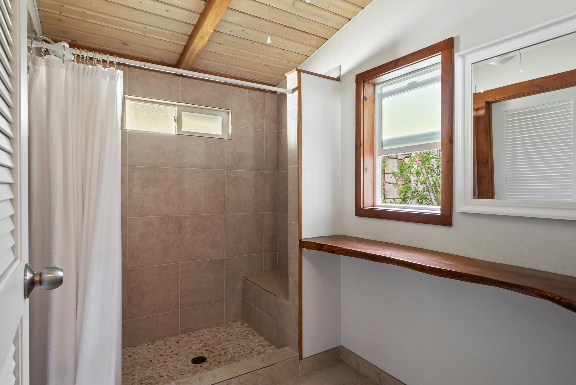 323 West Kuiaha Road Haiku, HI 96708 - Photo 27 of 30 a bathroom with a shower and a sink
