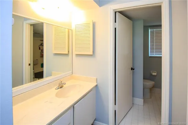 a bathroom with a shower curtain