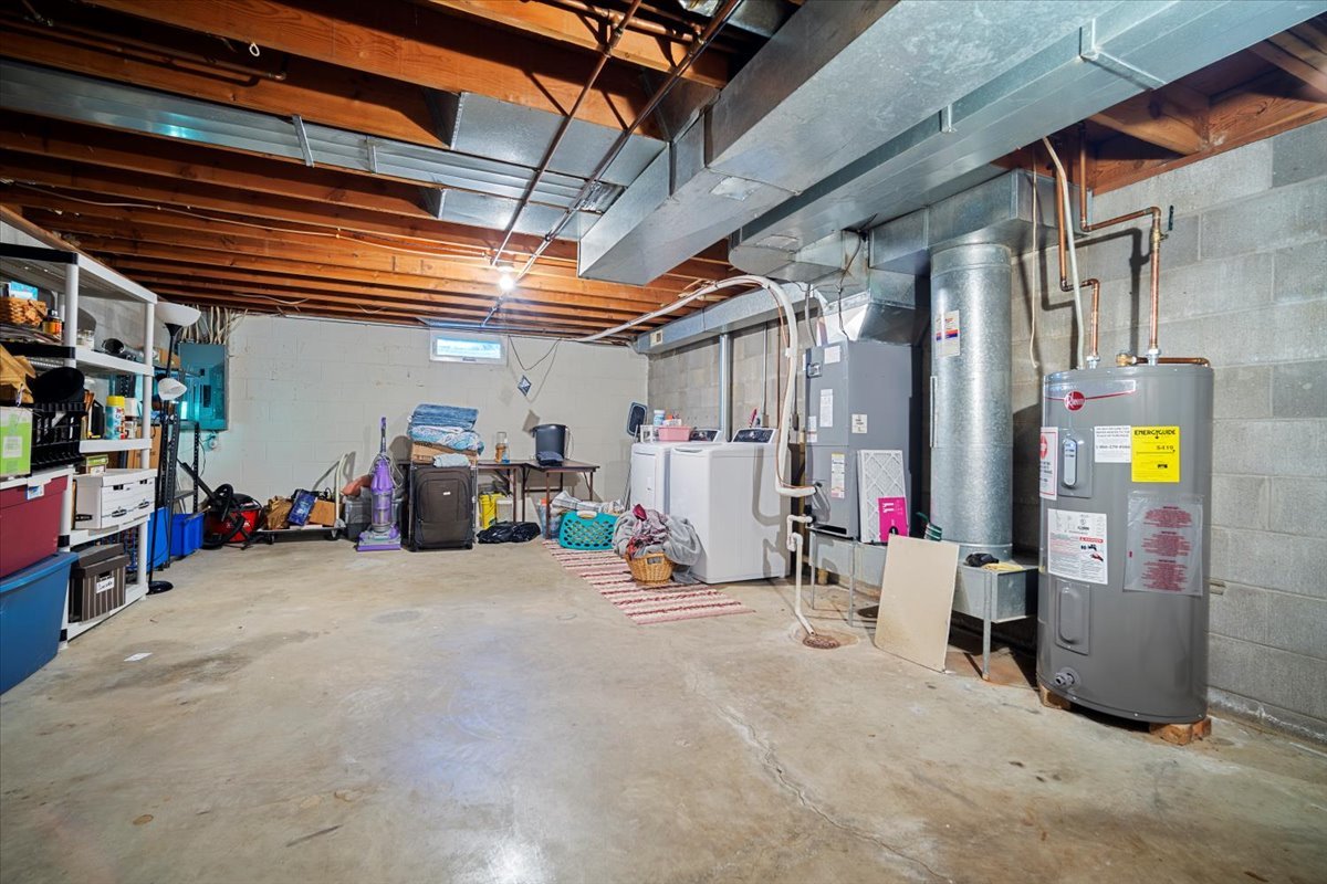 1702 Rockingham Drive, Unit 5 Normal, IL 61761 - Photo 13 of 17 a view of a garage with storage