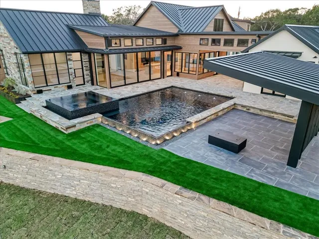 a view of a living room and kitchen
