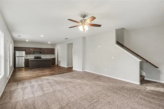 a view of a kitchen with a sink and dishwasher