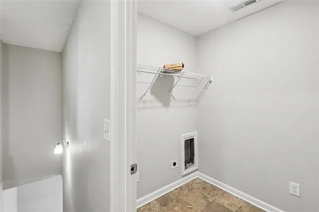 a view of hallway with stairs