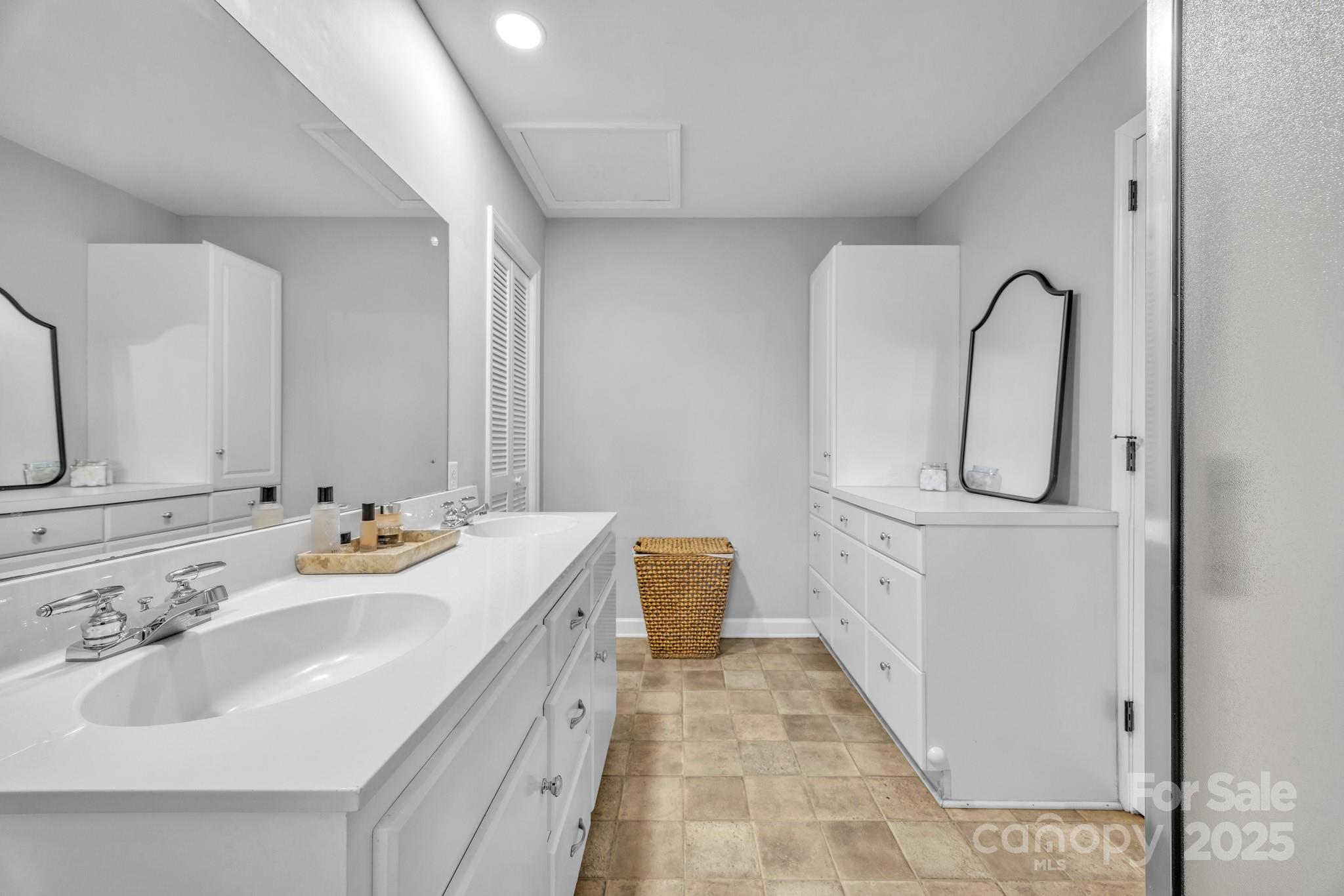 651 25th Avenue Northwest Hickory, NC 28601 - Photo 22 of 35 a bathroom with a double vanity sink mirror and bathtub
