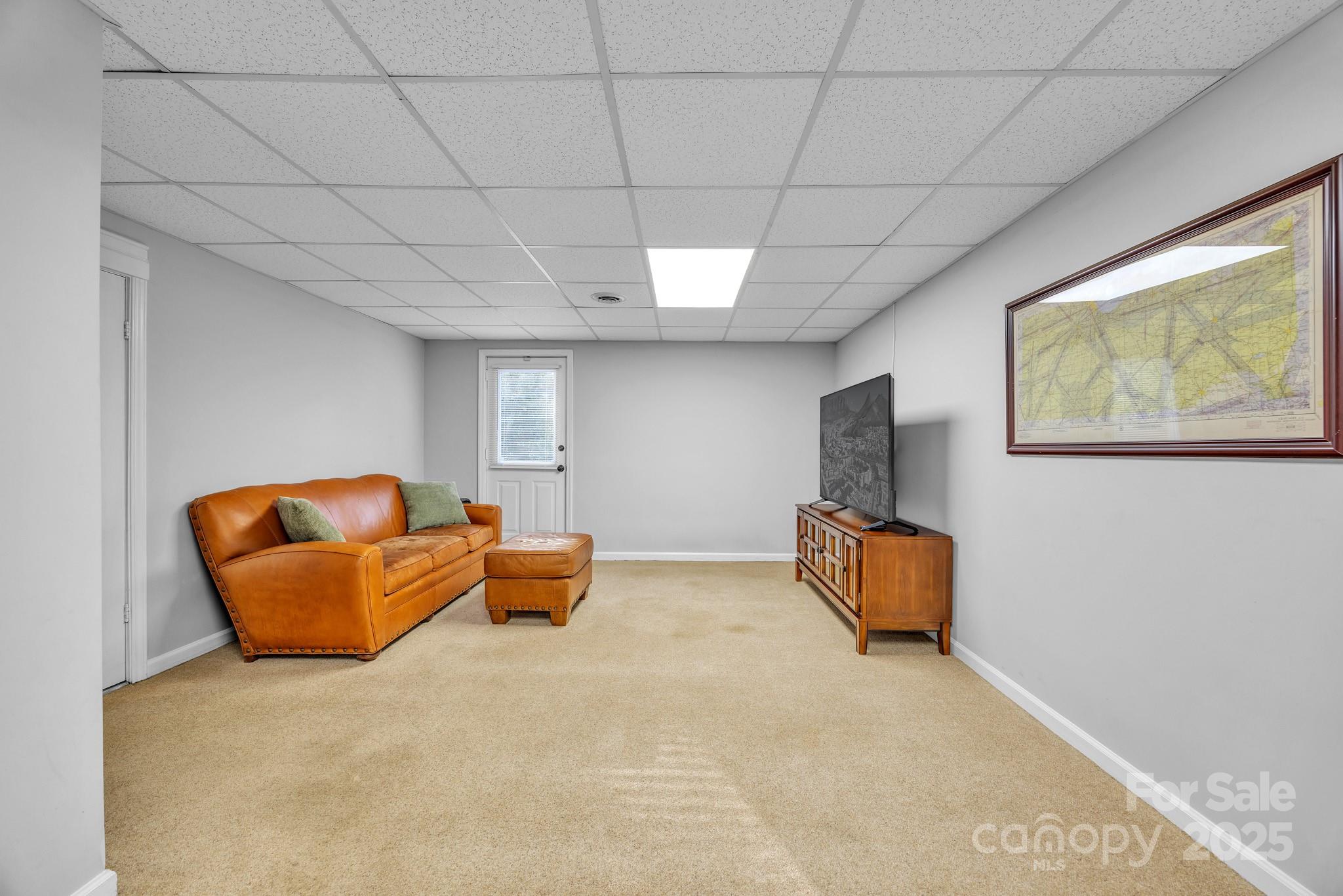 651 25th Avenue Northwest Hickory, NC 28601 - Photo 27 of 35 a bedroom with furniture and a couch