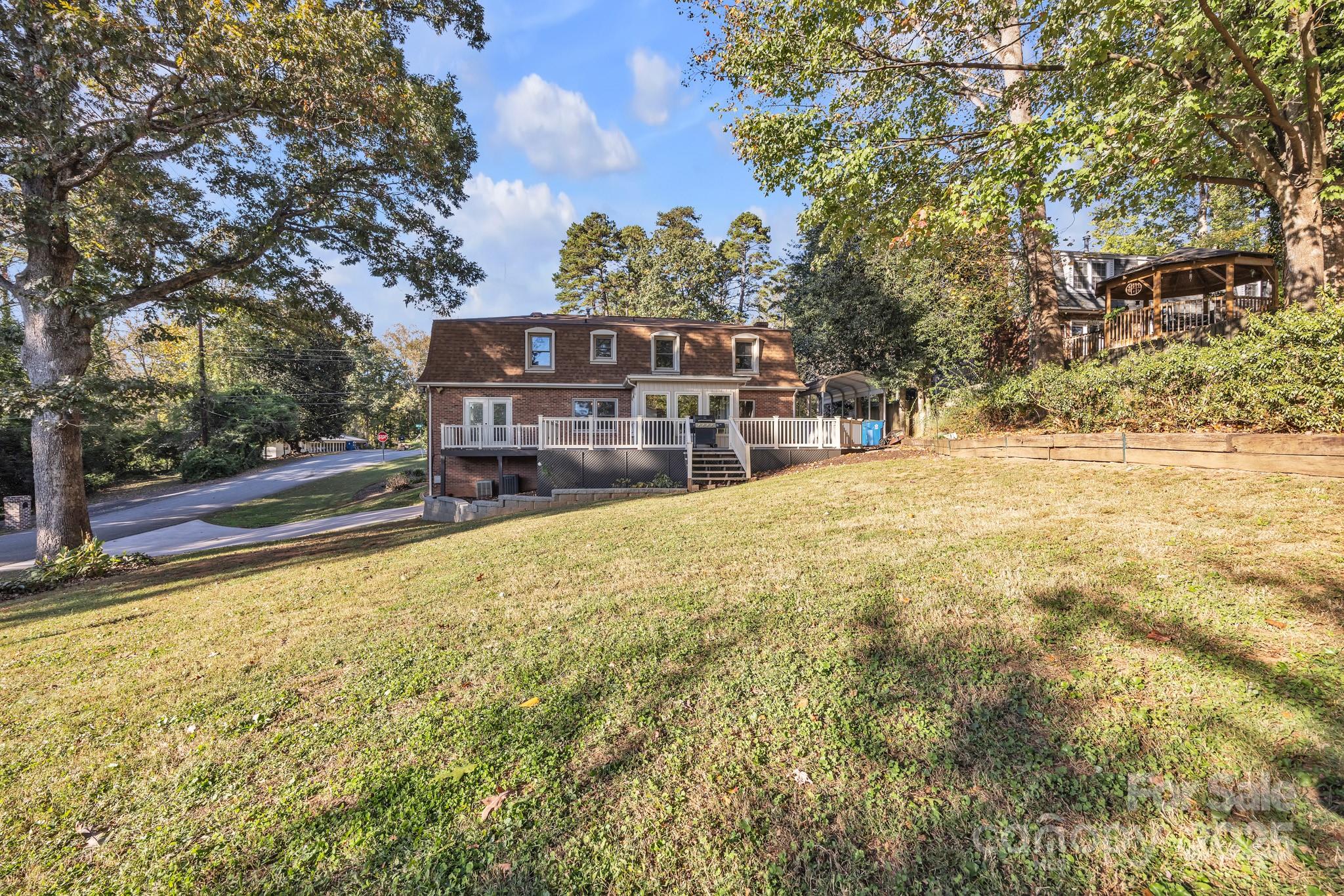 651 25th Avenue Northwest Hickory, NC 28601 - Photo 31 of 35 a view of a house with a large tree