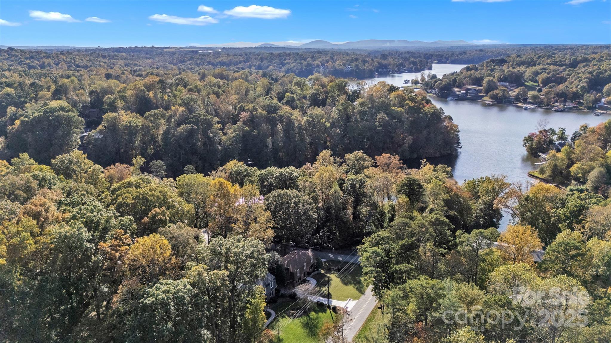 651 25th Avenue Northwest Hickory, NC 28601 - Photo 34 of 35 a view of a lake with mountains in the background