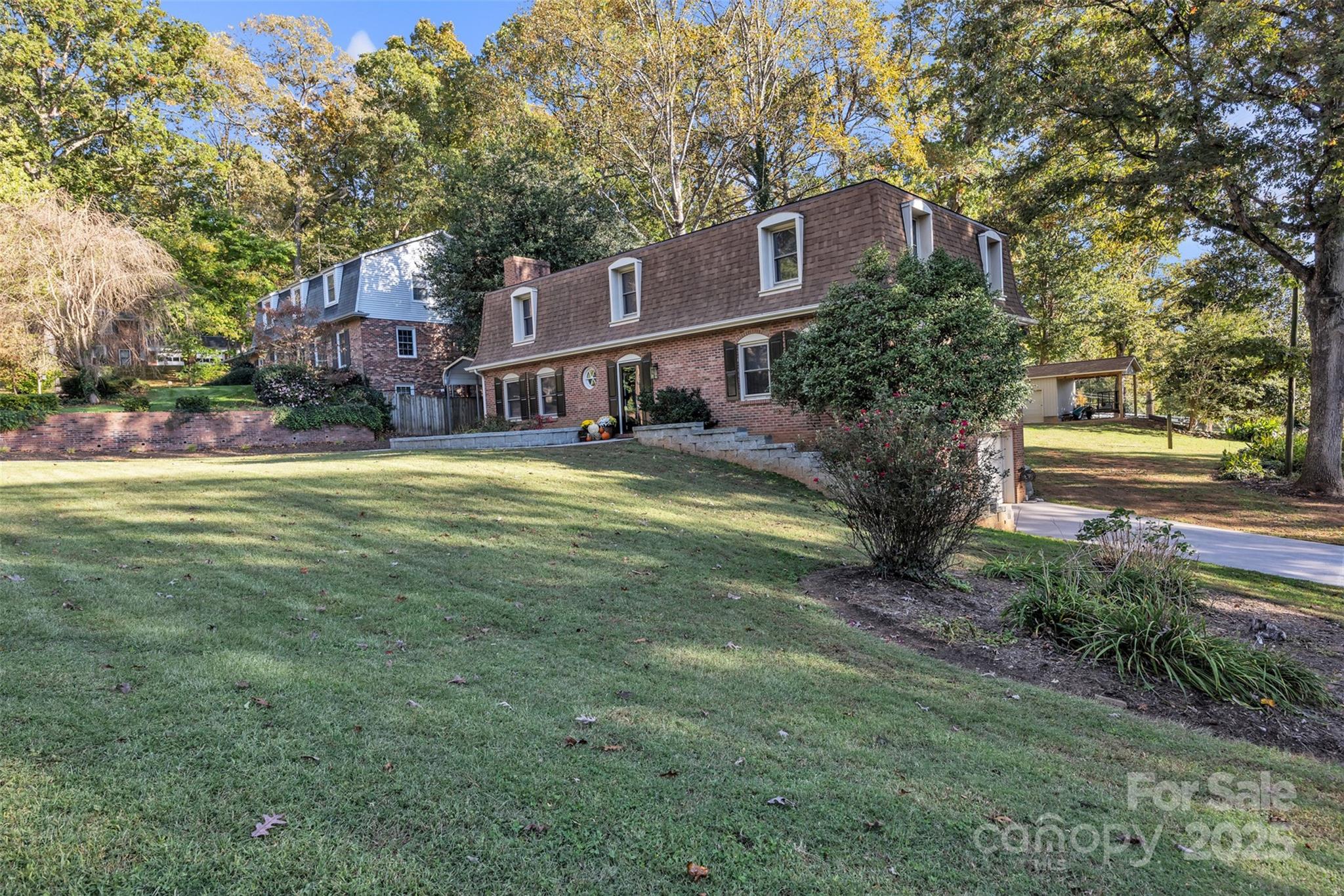 651 25th Avenue Northwest Hickory, NC 28601 - Photo 4 of 35 a view of a building with a yard