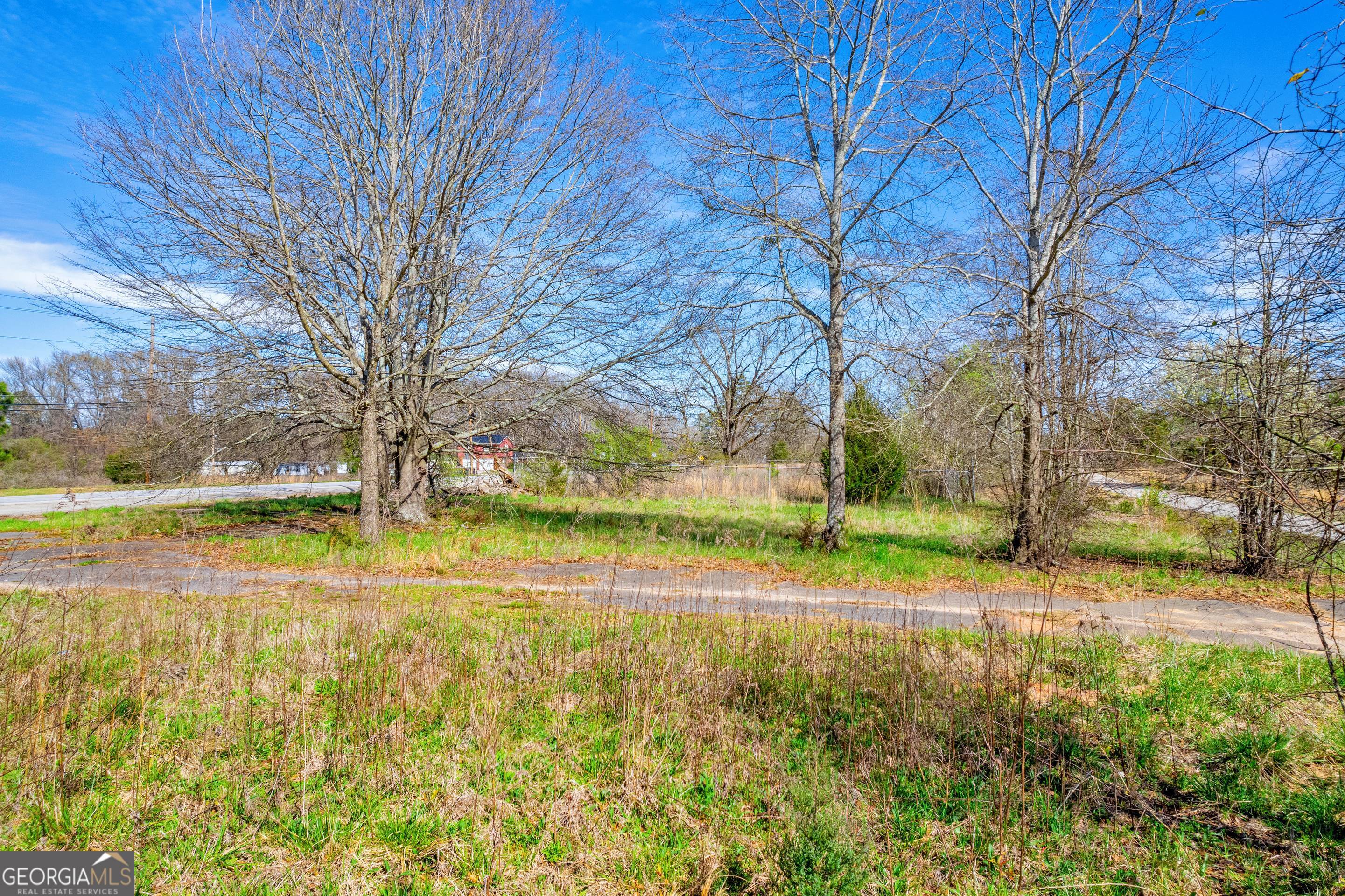 526 Madison Street Commerce, GA 30529 - Photo 11 of 23 a view of yard with swimming pool and green space