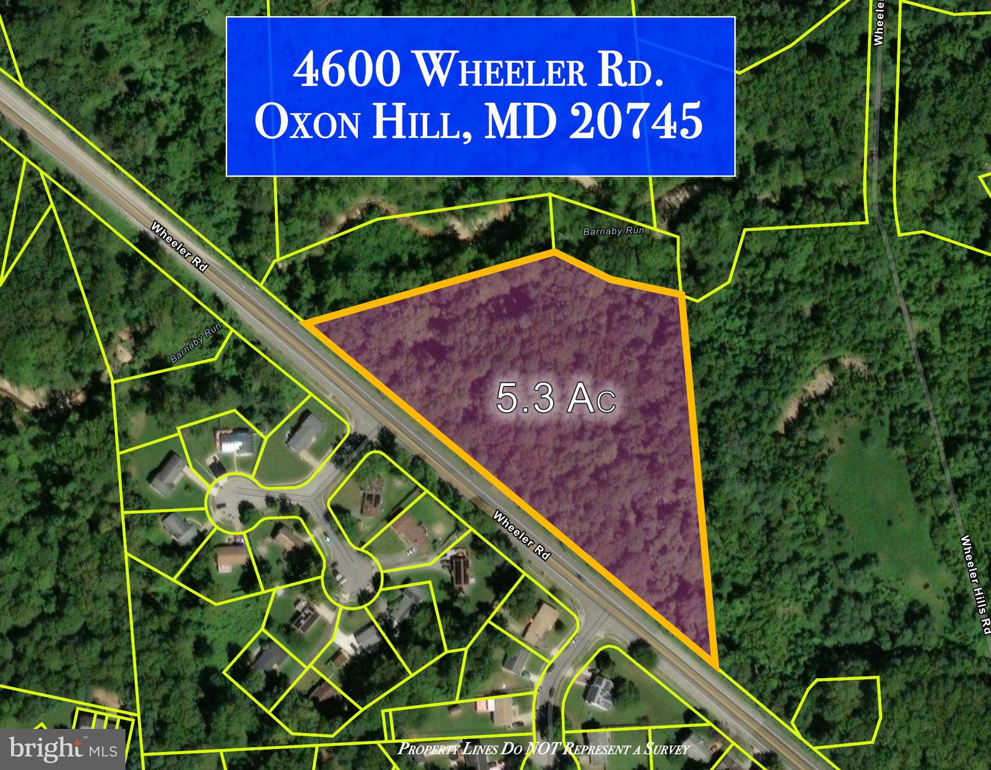 4600 Wheeler Road Oxon Hill, MD 20745 - Photo 4 of 9 a sign on the side of the wall